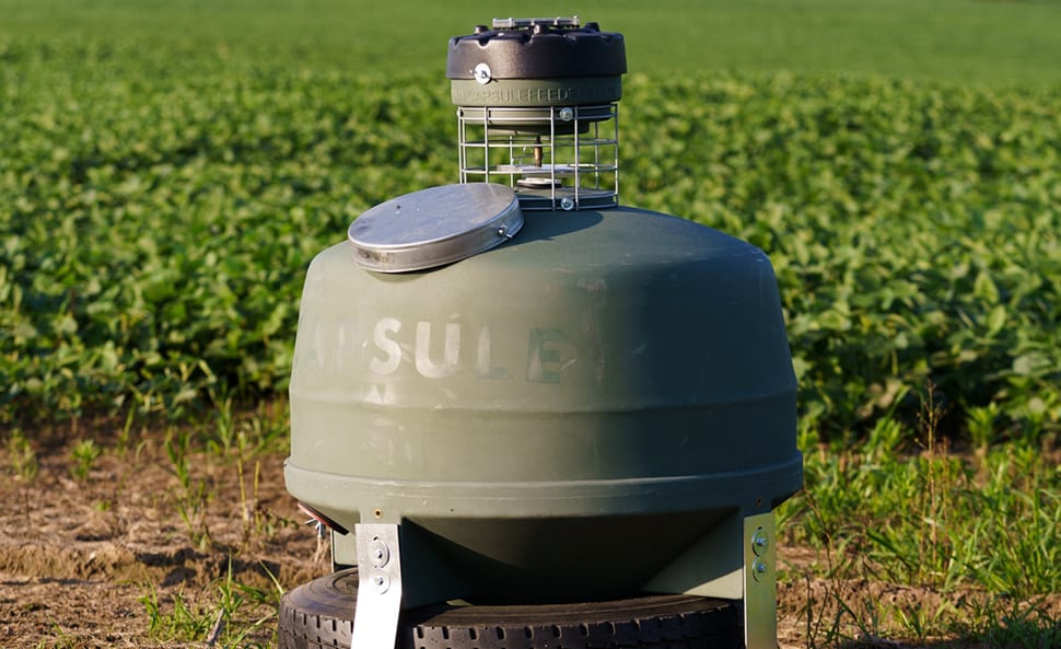 capsule feeders out in a field